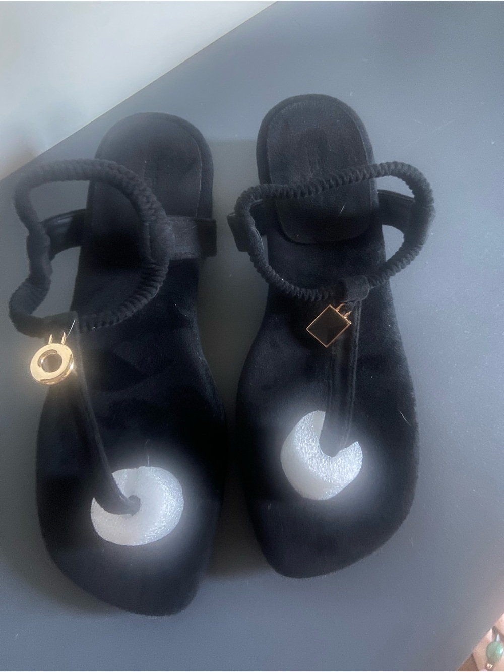 Black Women's Toe-Post Sandals with Decorative Gold Charms